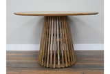 Round wooden dining table with slatted conical base, natural wood finish, viewed front on against neutral wall.