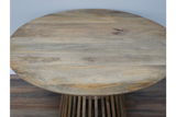 Round wooden dining table with slatted base in natural light brown finish, viewed from above.
