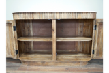 Wooden sideboard with open double doors showing two interior shelves, topped with a white marble slab, front view.