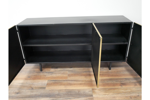 Large black wooden cabinet with three open doors, two interior shelves, standing on four legs on wooden floor.