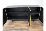 Large black wooden cabinet with three open doors, two interior shelves, standing on four legs on wooden floor.