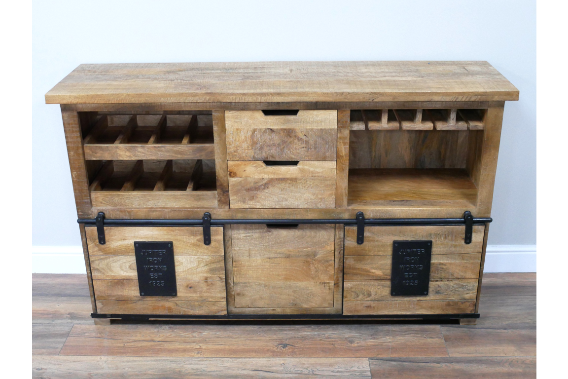 The Jupiter Wine Cabinet features a rustic wooden design with multiple wine slots, two drawers, and a spacious open compartment, all accented by black metal hardware
