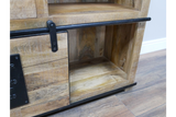 The Jupiter Wine Cabinet features a rustic wooden design with a metal handle, showcasing an open shelf and a closed compartment for storage