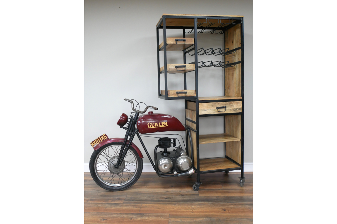 Motorbike-shaped bar cabinet with red metal front bike and wooden shelves with black metal frame, angled view.