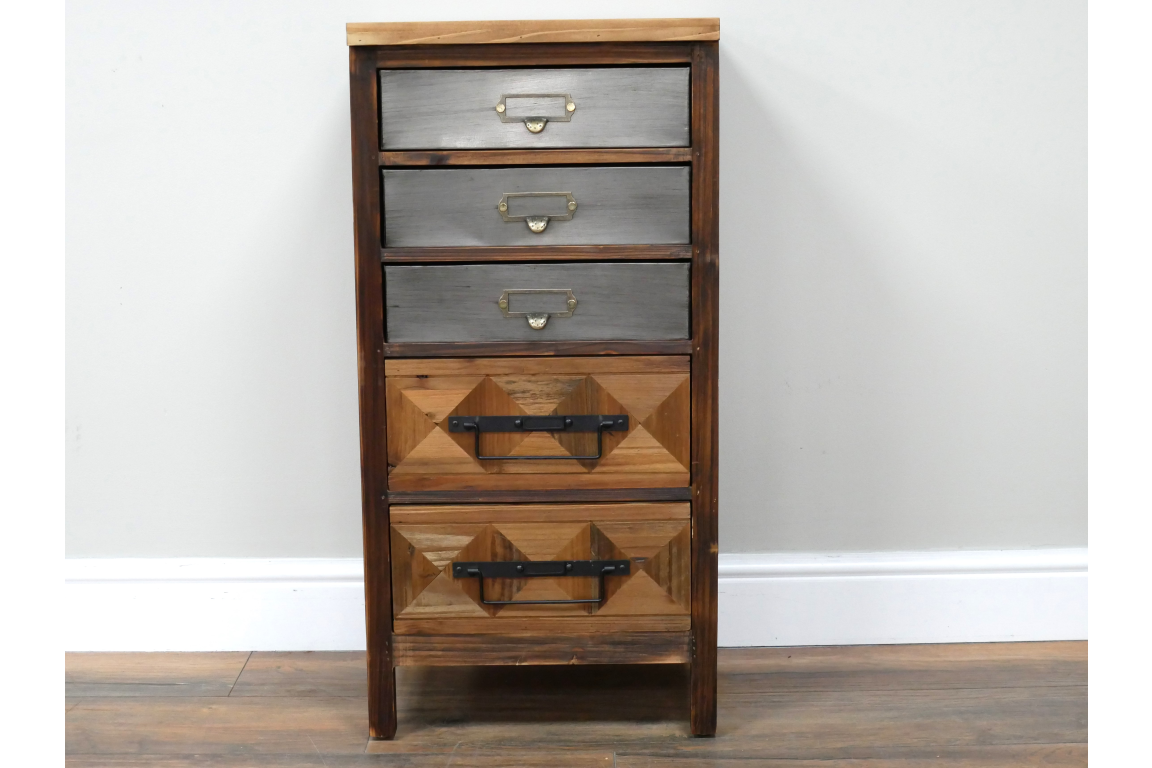 The rustic cabinet features a combination of four drawers with a mix of gray and natural wood finishes, accented by metal handles and a geometric design on the lower drawers