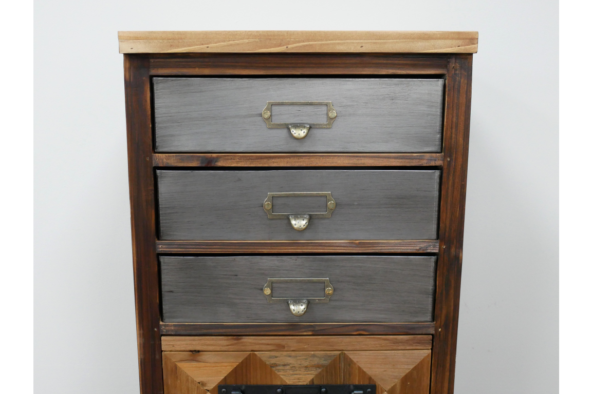 The rustic cabinet features a wooden frame with three gray drawers, each adorned with metal handles, and a natural wood top, showcasing a charming, vintage-inspired design