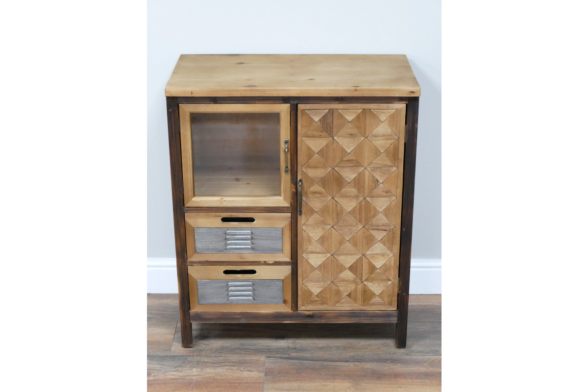 This rustic cabinet features a natural wood finish, a glass-paneled door, two drawers with metal accents, and a decorative geometric pattern on the side door