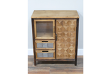 This rustic cabinet features a natural wood finish, a glass-paneled door, two drawers with metal accents, and a decorative geometric pattern on the side door