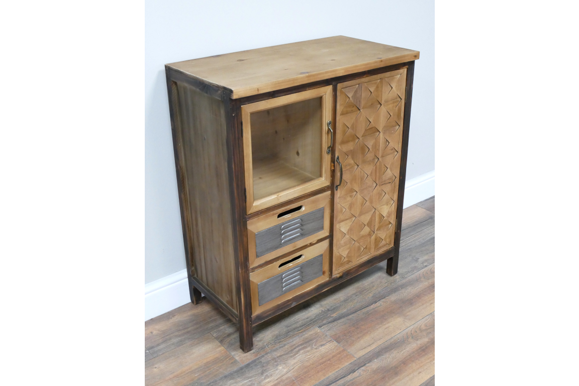 This rustic cabinet features a wooden design with a glass display section, two drawers with metal handles, and a decorative patterned door for stylish storage