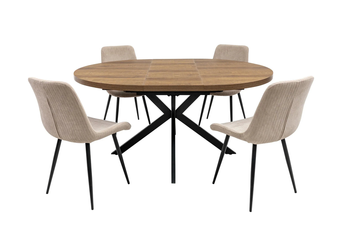 Round wooden dining table with black metal legs and four beige upholstered chairs