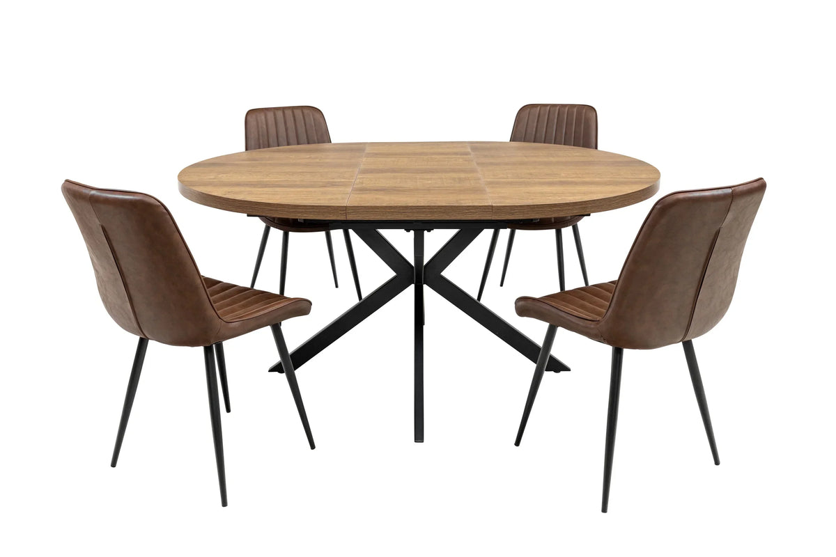 Round wooden dining table with black metal legs and four brown faux leather chairs