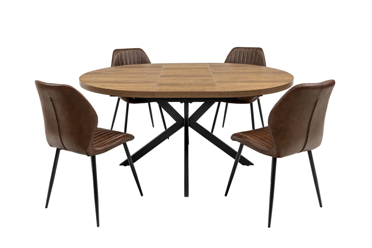 Round wooden dining table with black metal legs and four brown faux leather chairs