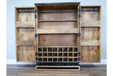 The black Solstice Wine Cabinet features two doors, multiple shelves, a wine rack for bottles, and a sleek design that s any living space