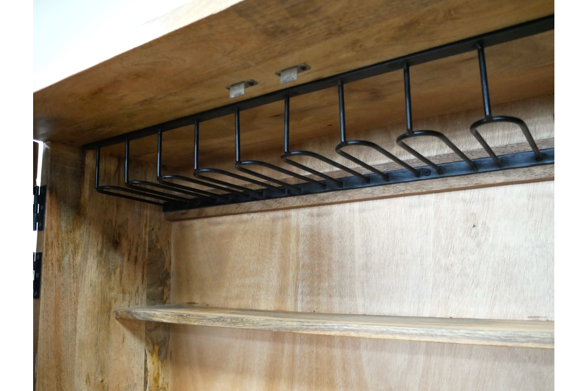 The wine cabinet features a natural wood finish with a metal rack for hanging wine glasses and a spacious shelf for storing bottles or accessories