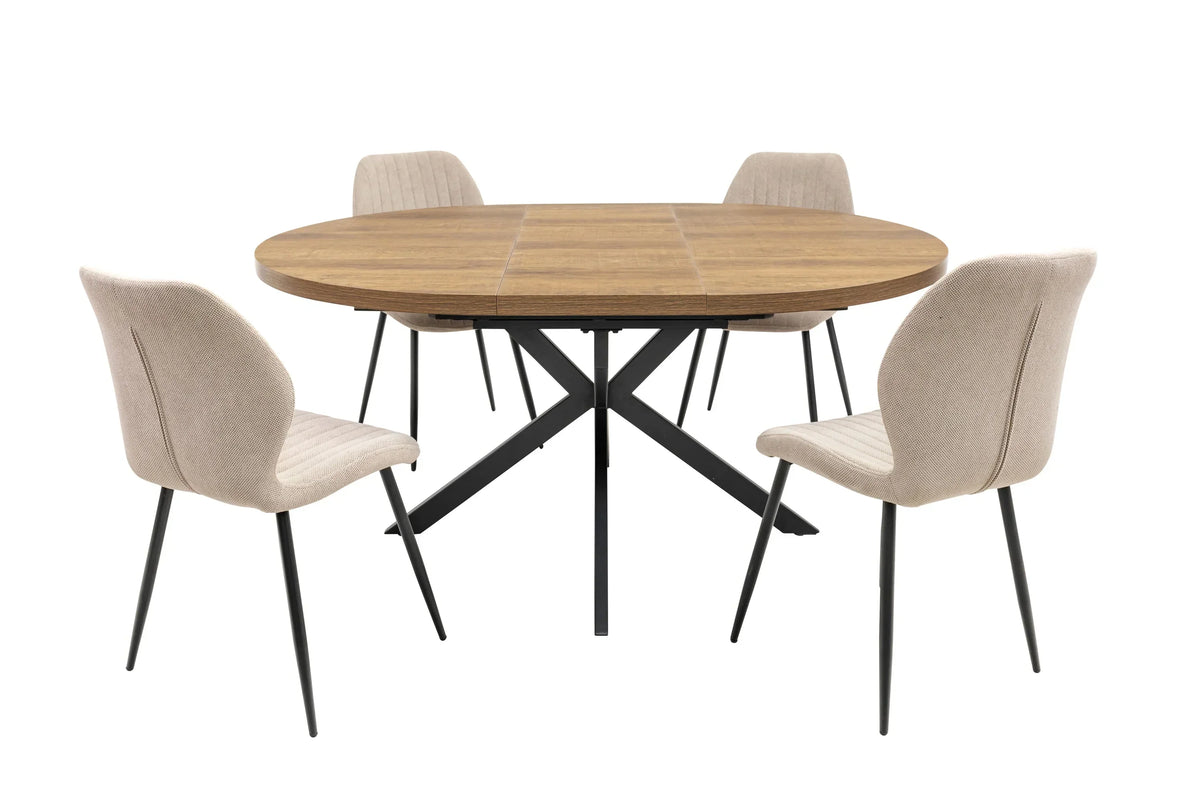 Round wood dining table with black metal legs and four beige fabric dining chairs
