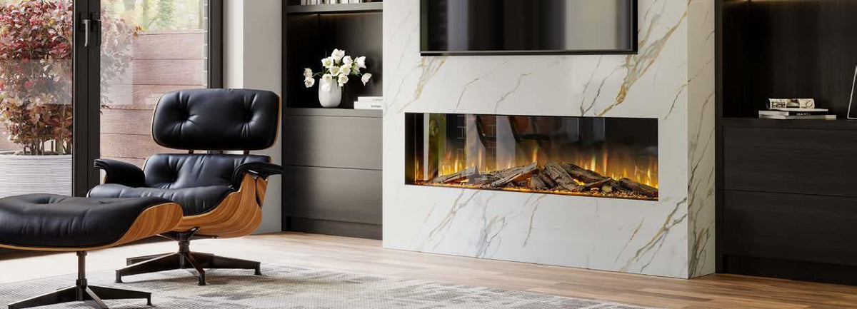 Modern electric fireplace with marble surround beside black lounge chair in living room