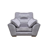 Grey fabric armchair with wide padded arms and matching scatter cushions, front view