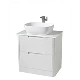 White bathroom vanity unit with vessel sink and chrome mixer tap