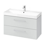 White bathroom vanity unit with integrated basin and chrome faucet, two drawer storage