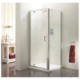 Square glass shower enclosure with chrome frame in modern tiled bathroom