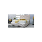 Beige upholstered bed frame with tall tufted headboard in modern bedroom setting