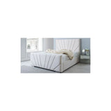 Cream upholstered bed frame with panel detail in modern bedroom setting