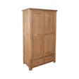Oak wardrobe with two panel doors and two drawers, classic wood grain finish, angled view