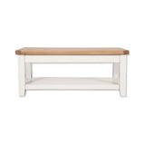 Rectangular coffee table with oak top and white wooden base with lower shelf