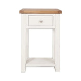 White wooden bedside table with oak top, single drawer and open shelf, front view