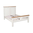 White wooden bed frame with slatted headboard and natural wood tops