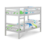 White wooden bunk bed with dinosaur print bedding and safety rails