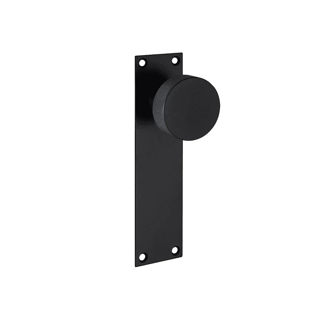 Black door knob with rectangular backplate and four screw holes, modern hardware design