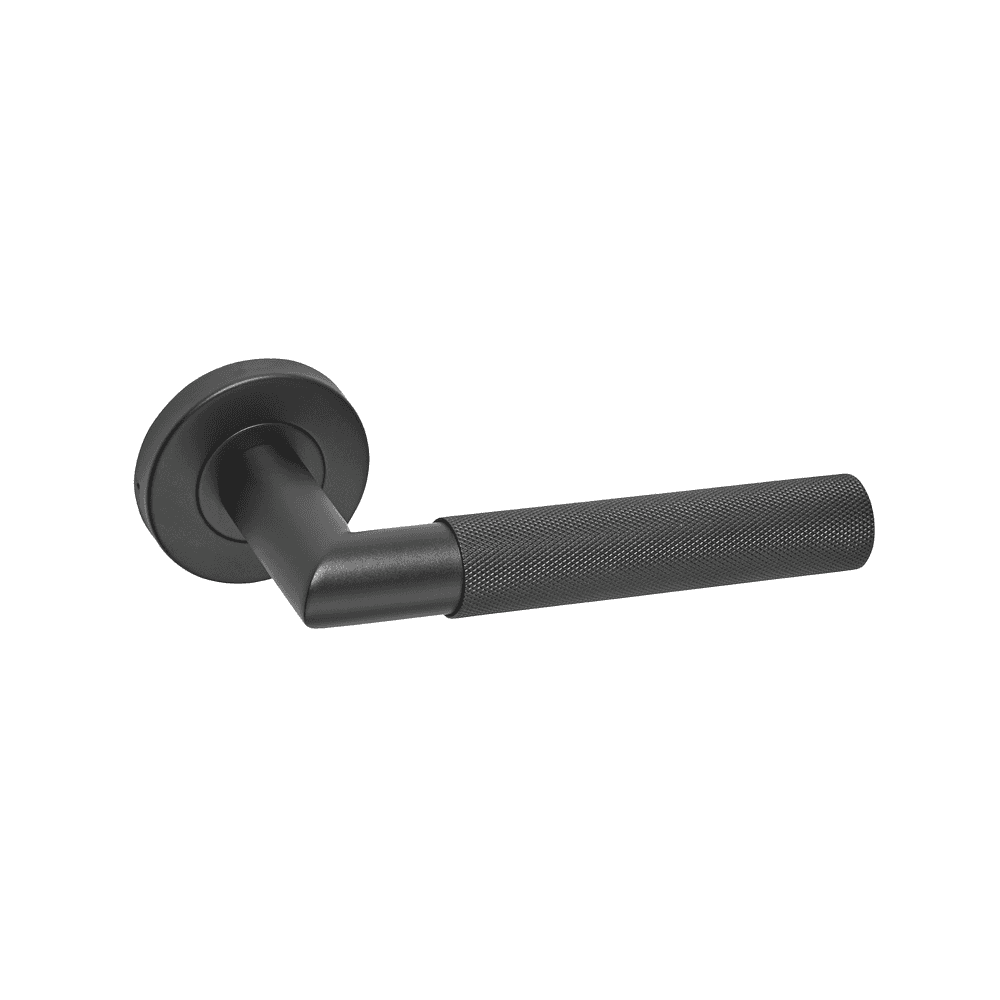 Matte black door handle with textured lever and round rose on white background