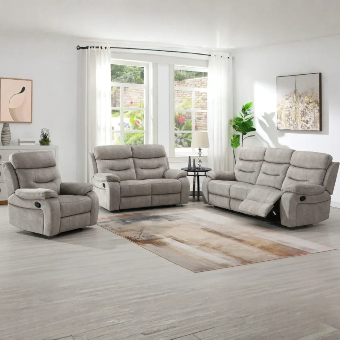 Cream recliner armchair and matching sofas in modern living room with natural light