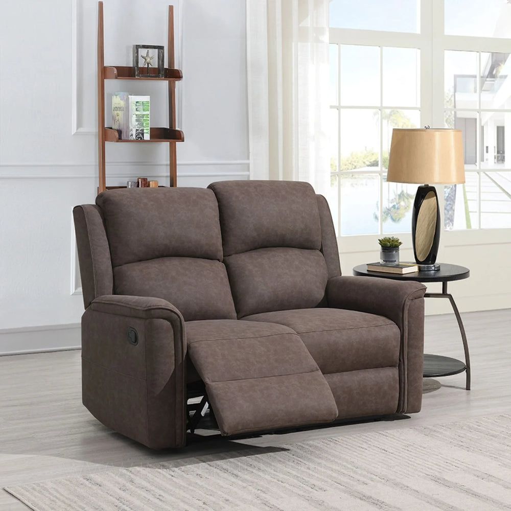 Brown fabric recliner sofa with extended footrest in bright living room setting