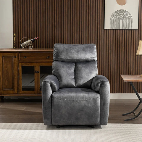 Dark grey recliner armchair with plush upholstery in a modern living room setting