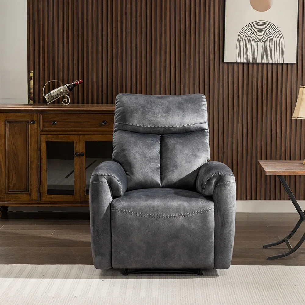 Dark grey recliner armchair with plush upholstery in a modern living room setting