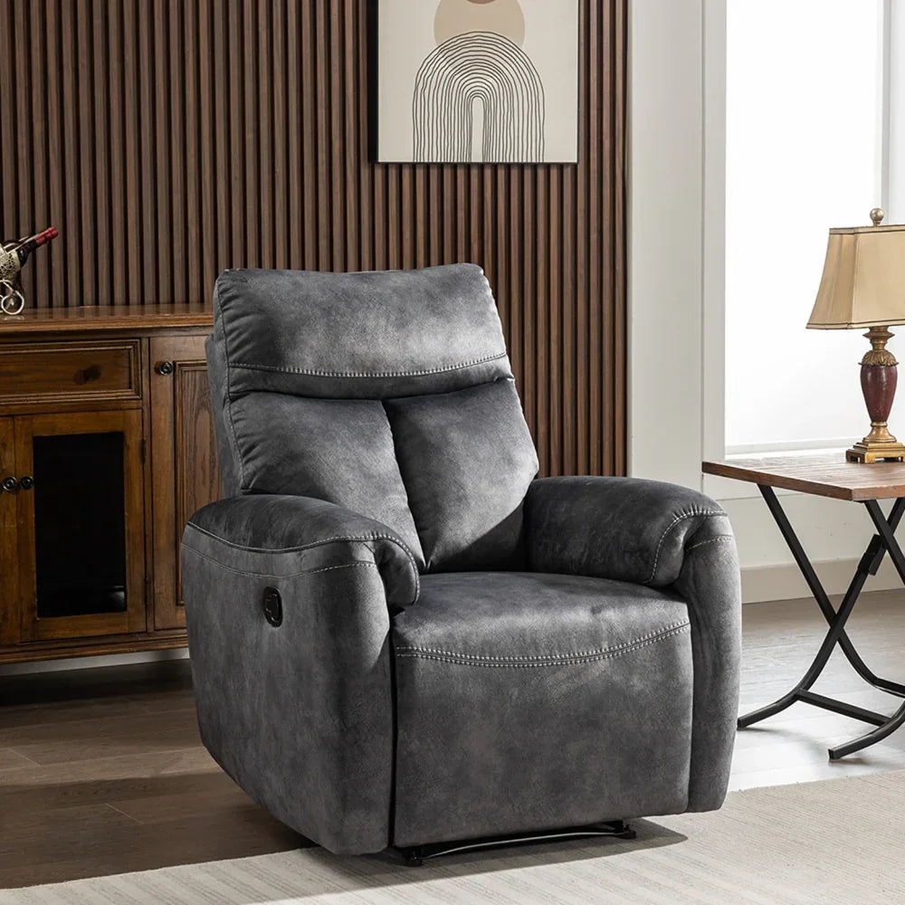 Dark grey fabric recliner chair with stitched detailing in modern living room