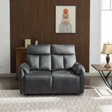 Dark grey recliner sofa on patterned rug with modern wooden wall and artwork background
