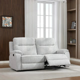 Light grey fabric recliner sofa with extended footrest in modern living room setting
