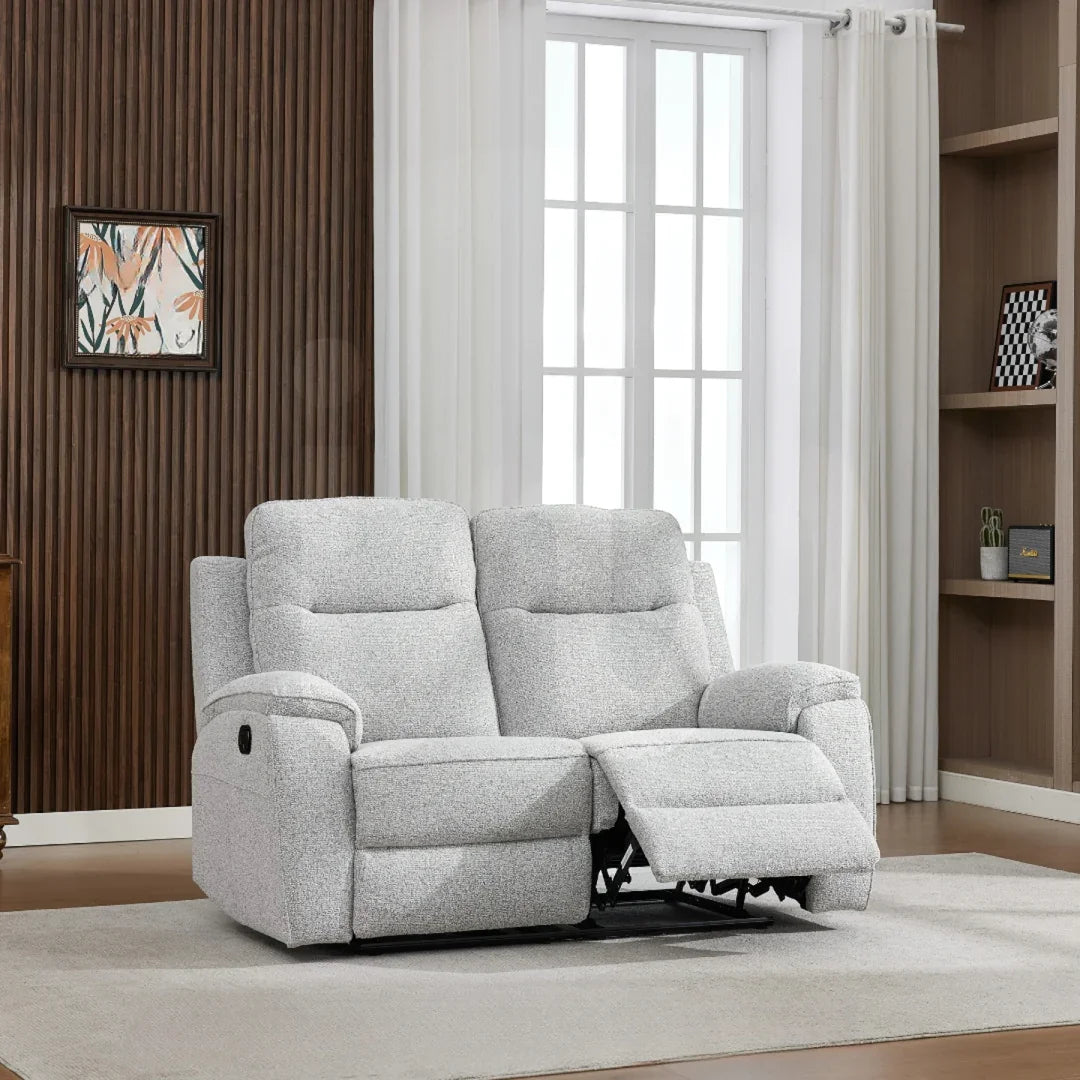 Light grey loveseat recliner with soft fabric upholstery in modern living room setting