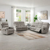 Cream reclining sofa set with matching piping in modern living room with large windows