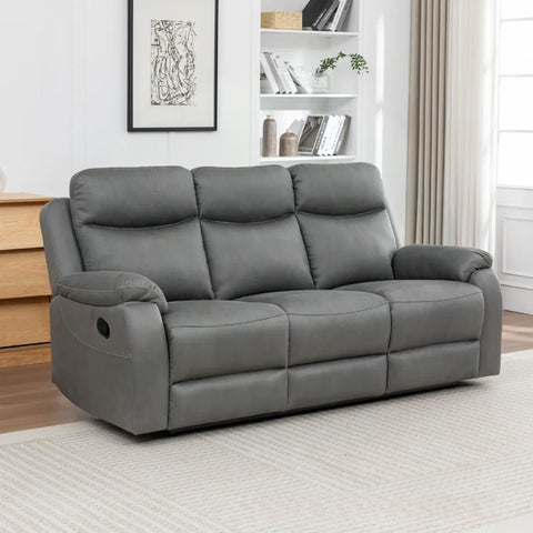 Charcoal three seater fabric sofa with plush cushions in modern living room setting