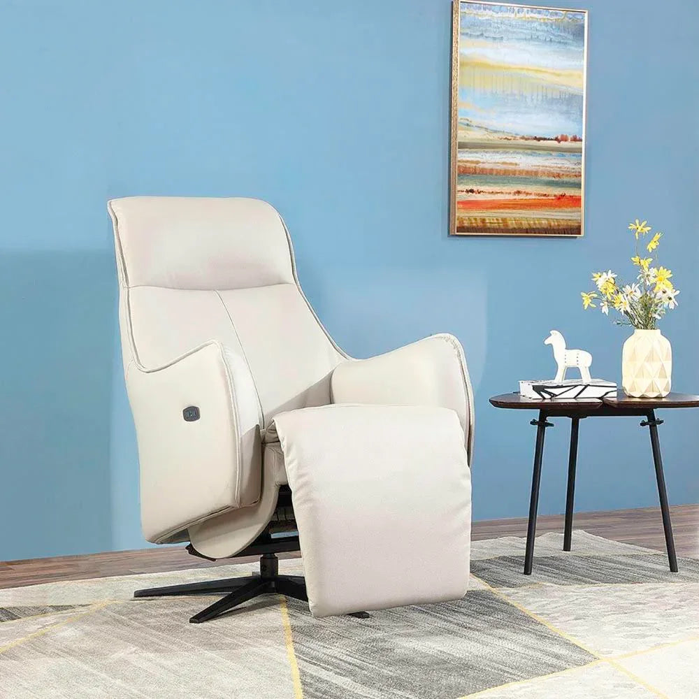 Light grey electric recliner chair with footrest extended in modern living room setting
