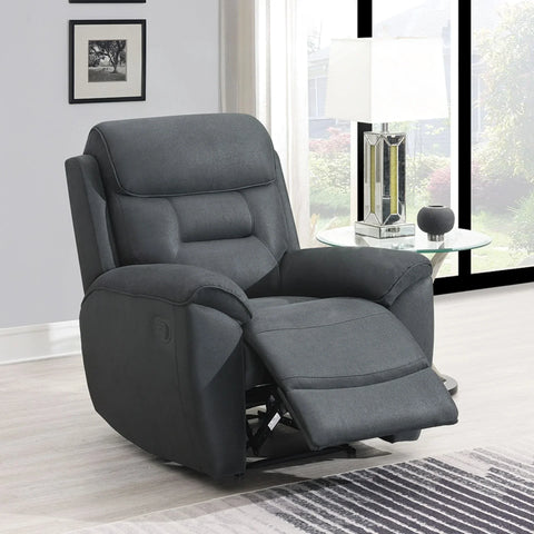 Slate grey recliner armchair with padded seat and leg rest in living room setting