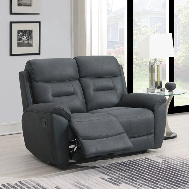 Slate grey fabric recliner sofa with extended footrest in modern living room setting