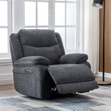 Dark grey electric recliner armchair with extended footrest in modern living room setting