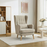 Beige wing chair with pillow on white rug in modern living room setting