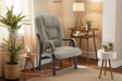 Light tan orthopaedic chair with padded seat and wooden arms in living room setting