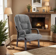 Slate grey orthopaedic chair with padded seat and wooden arms in living room setting